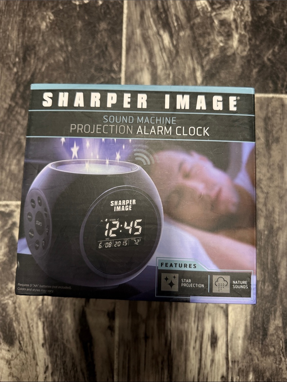 Sharper image projection alarm clock sound machine